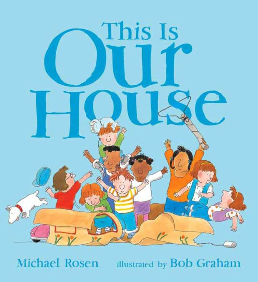 Book cover for 'This Is Our House' by Michael Rosen, showing George and a large cardboard box house in a lesson about exclusion and belonging.